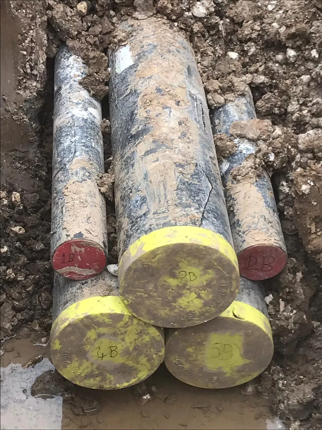 The installed and capped black HDPE cable ducts (Peak Pipes clear duct) for the Hornsea Two 400kV connection, after jetting and CCTV survey