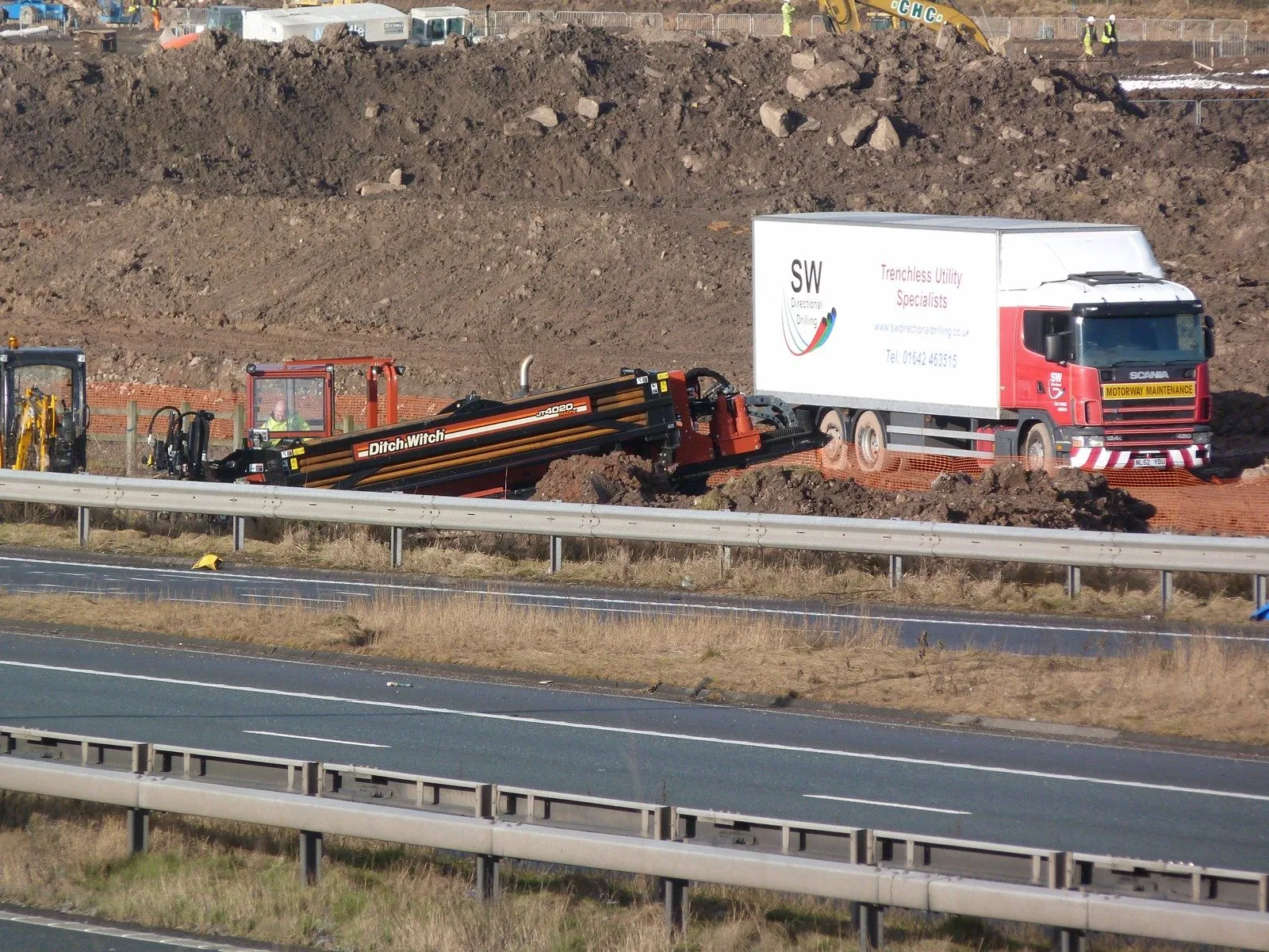 An S.W.Directional Drilling vehicle on the M5 hard shoulder beside the live carriageway during the smart motorway crossings
