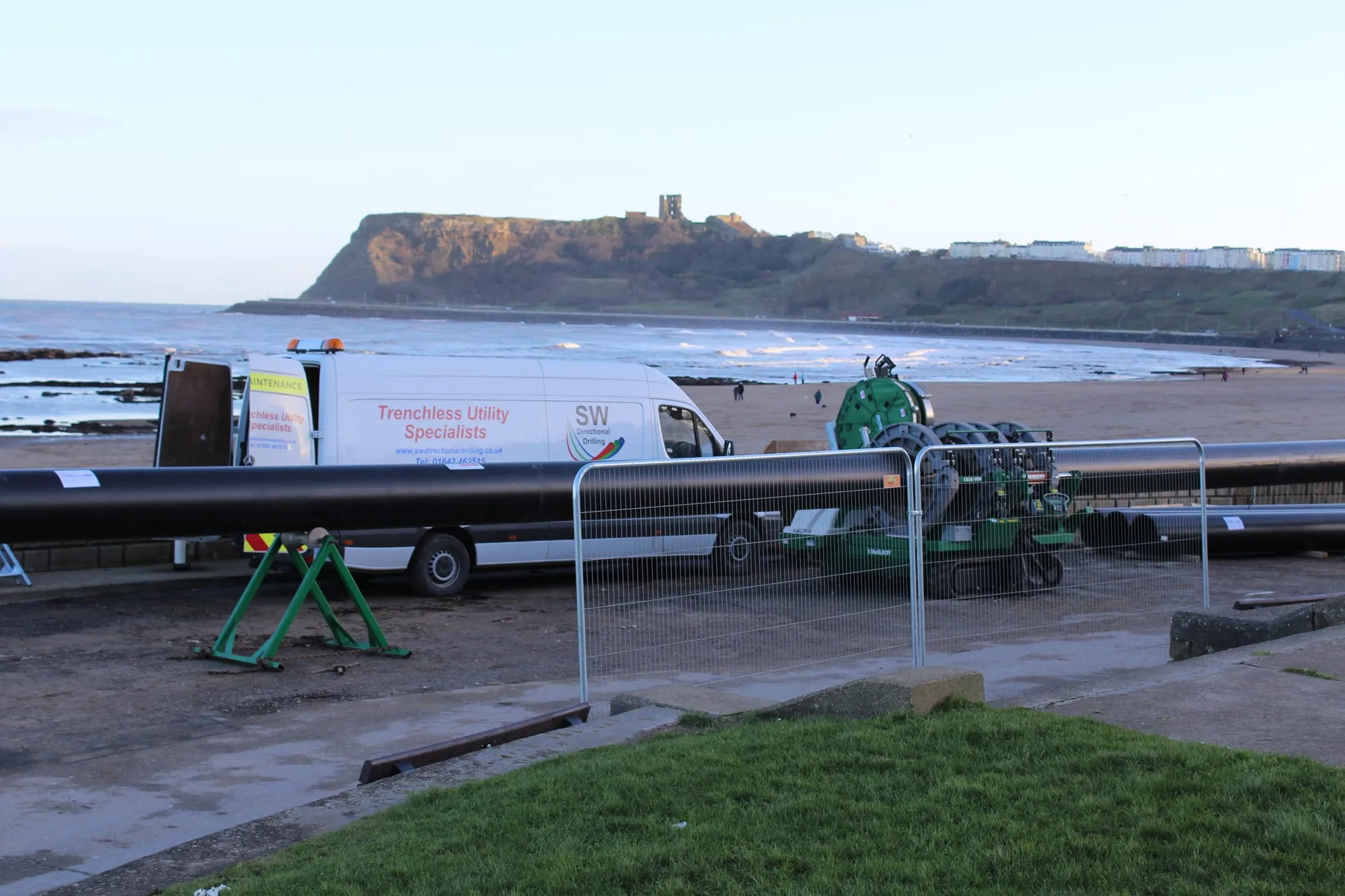 Large-diameter pipe being welded on site before a trenchless installation