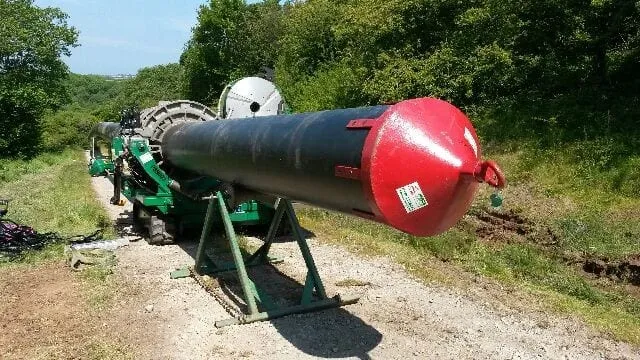 Pipe being installed by directional drilling